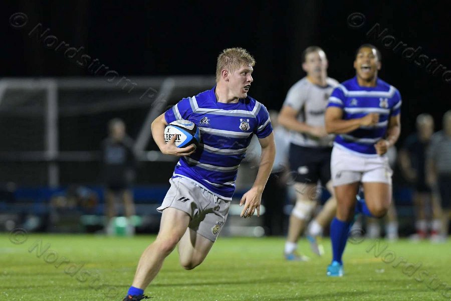 Wheaton Men\'s Rugby vs Mass Maritime.  Photo by Keith Nordstrom